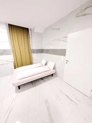 Ein Bett oder Betten in einem Zimmer der Unterkunft Cozy Apartment in Landstrasse area BR2