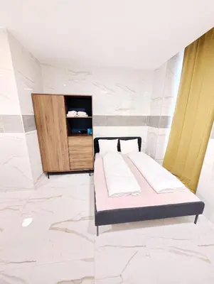 Ein Bett oder Betten in einem Zimmer der Unterkunft Cozy Apartment in Landstrasse area BR2