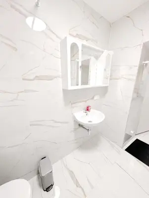 Ein Badezimmer in der Unterkunft Cozy Apartment in Landstrasse area BR2