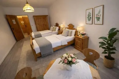 Ein Bett oder Betten in einem Zimmer der Unterkunft Pension Ursula
