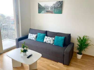 Ein Sitzbereich in der Unterkunft 55 m2 Stylish Apartment with Balcony & Free Parking