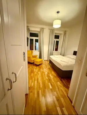 Ein Bett oder Betten in einem Zimmer der Unterkunft Central Apartment Vienna
