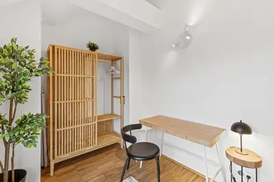 Ein Bett oder Betten in einem Zimmer der Unterkunft Long Term Rental - 1BR Near Stadthalle