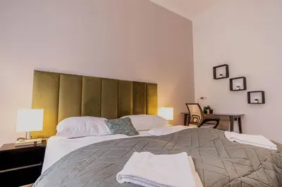 Ein Bett oder Betten in einem Zimmer der Unterkunft Bright and Cozy 2-Bedroom Apartment in Vienna