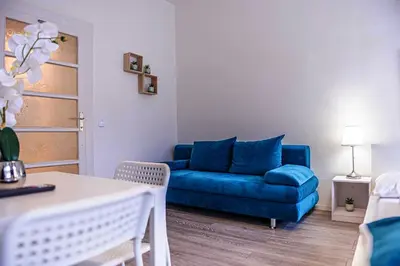 Ein Sitzbereich in der Unterkunft Modern Apartment in Wiener Stadthalle Area