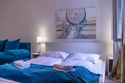 Ein Bett oder Betten in einem Zimmer der Unterkunft Modern Apartment in Wiener Stadthalle Area