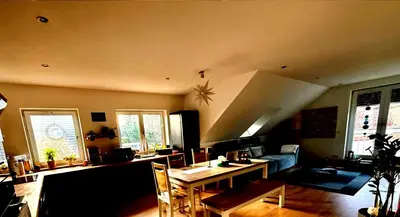 Ein Sitzbereich in der Unterkunft Chalet Traeger