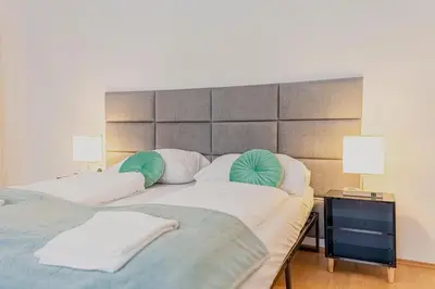 Ein Bett oder Betten in einem Zimmer der Unterkunft Spacious Private Rooms in a Shared Apartment in Vienna