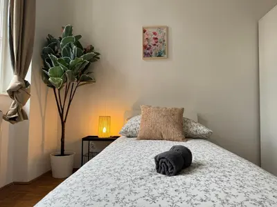 Ein Bett oder Betten in einem Zimmer der Unterkunft 130 m2 Spacious Apartment