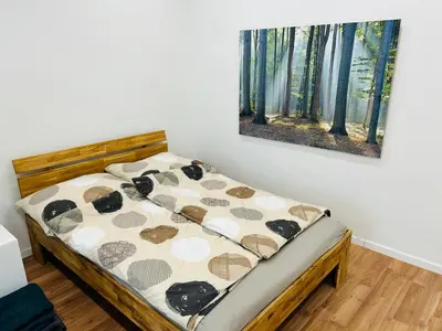 Ein Bett oder Betten in einem Zimmer der Unterkunft Long Term Central Apartment