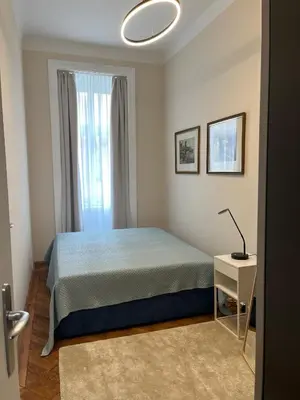 Ein Bett oder Betten in einem Zimmer der Unterkunft Appartement Mondscheingasse