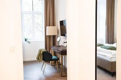 Ein Bett oder Betten in einem Zimmer der Unterkunft Cozy Central Vienna