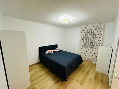 Ein Bett oder Betten in einem Zimmer der Unterkunft Luxury apartment VIENNA Airport Free PARKING
