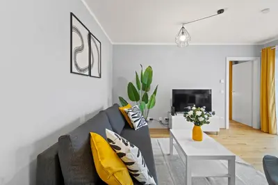 TV/Unterhaltungsangebot in der Unterkunft Modern 1BR near Meidling Metro - Free Parking