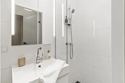 Ein Badezimmer in der Unterkunft Modern and Spacious at Millennium City - 6 min to metro