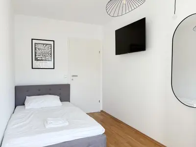 Ein Bett oder Betten in einem Zimmer der Unterkunft ampm Grasbergergasse - Coliving Vienna I Monthly Stays