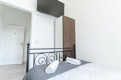 Ein Bett oder Betten in einem Zimmer der Unterkunft Beautiful 3 Bedroom Urban Retreat in Vienna Center