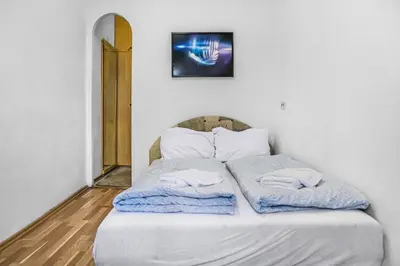 Ein Bett oder Betten in einem Zimmer der Unterkunft Basic 2BR Apartment Millennium Tower Long Stay