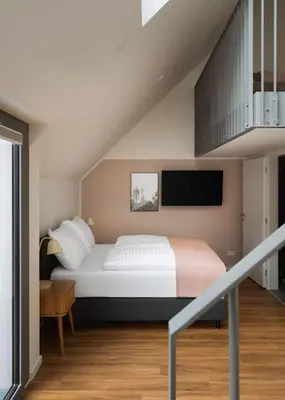 Ein Bett oder Betten in einem Zimmer der Unterkunft Limehome Vienna Vivenotgasse