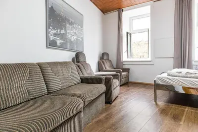 Ein Sitzbereich in der Unterkunft Modern 1BR Apartment Close to the Danube River