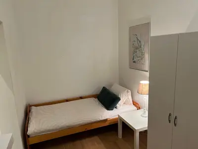 Ein Bett oder Betten in einem Zimmer der Unterkunft Lory nice Apartment
