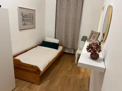 Ein Bett oder Betten in einem Zimmer der Unterkunft Lory nice Apartment