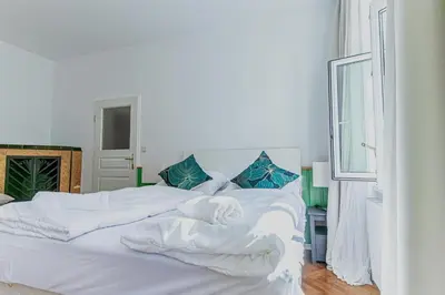 Ein Bett oder Betten in einem Zimmer der Unterkunft Comfortable Private Rooms Near Landstraße , 15 Min Access