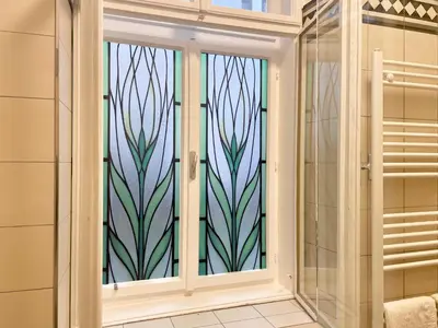 Ein Badezimmer in der Unterkunft Elegantes Zimmer mit eigenem Bad nahe Hbf, Zentrum