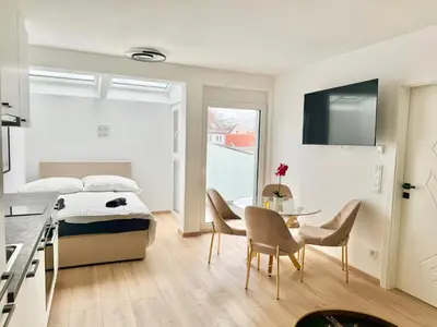 Ein Bett oder Betten in einem Zimmer der Unterkunft Rooftop Luxury Apartment with Free Parking