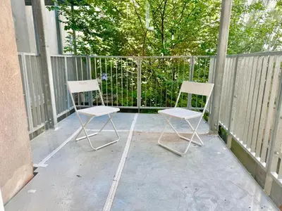 Ein Balkon oder eine Terrasse in der Unterkunft Renovated Stylish Apartment