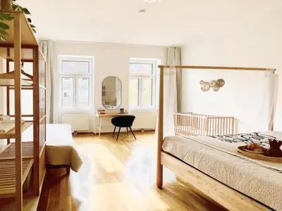Ein Bett oder Betten in einem Zimmer der Unterkunft Servus Homes - Metro Stadthalle - Kaiser Franz Josef