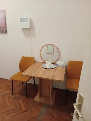 Ein Sitzbereich in der Unterkunft City Residence Home