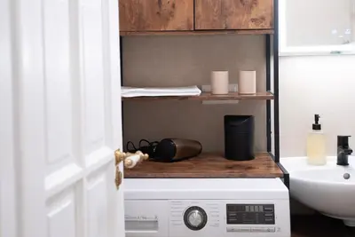 Ein Bett oder Betten in einem Zimmer der Unterkunft Design Micro-Studio - 10 minutes to Central Station