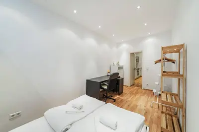 Ein Bett oder Betten in einem Zimmer der Unterkunft Belvedere City Spacious Apartment