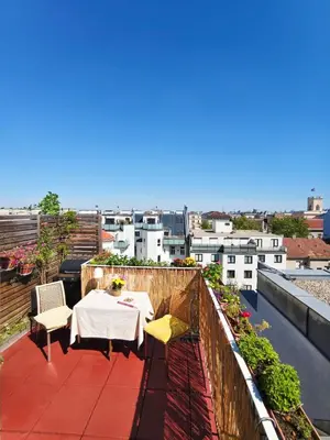 Ein Balkon oder eine Terrasse in der Unterkunft Dachgeschosswohnung mit Dachterrasse