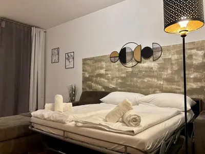 Ein Bett oder Betten in einem Zimmer der Unterkunft Elegantes CityApartment Vienna mit Wohlfühlfaktor