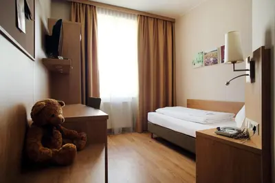 Ein Bett oder Betten in einem Zimmer der Unterkunft Hotel Babenbergerhof