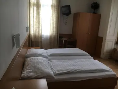 Ein Bett oder Betten in einem Zimmer der Unterkunft Pension Ani
