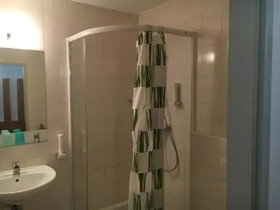 Ein Badezimmer in der Unterkunft Pension Ani-Falstaff