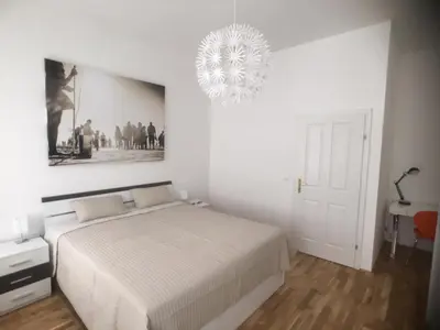 Ein Bett oder Betten in einem Zimmer der Unterkunft Boutique Apartments Vienna