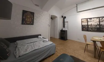 Ein Sitzbereich in der Unterkunft Apartment LAER Hundertwasserhaus