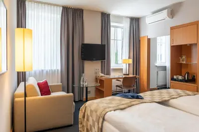 Ein Bett oder Betten in einem Zimmer der Unterkunft Holiday Inn Vienna City by IHG
