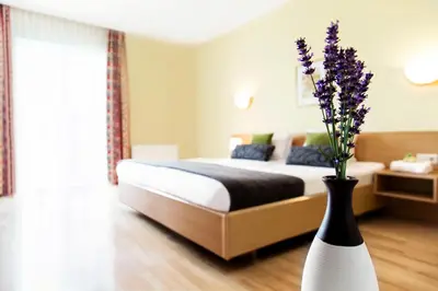Ein Bett oder Betten in einem Zimmer der Unterkunft Landhaus Pannonia