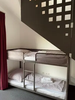 Ein Bett oder Betten in einem Zimmer der Unterkunft Hotel Caldor - 24h self-check in