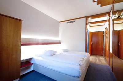 Ein Bett oder Betten in einem Zimmer der Unterkunft Vienna Sporthotel