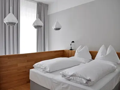 Ein Bett oder Betten in einem Zimmer der Unterkunft grätzlhotel Meidlinger Markt