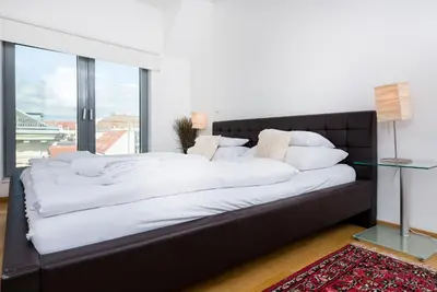 Ein Bett oder Betten in einem Zimmer der Unterkunft Heart of Vienna with Aircondition