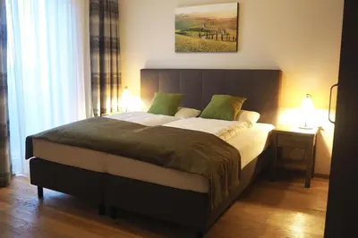 Ein Bett oder Betten in einem Zimmer der Unterkunft Mattone Aparthotel