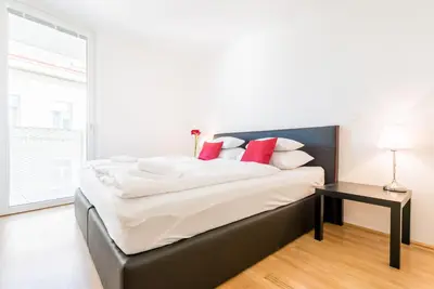 Ein Bett oder Betten in einem Zimmer der Unterkunft Vienna Mainstation - 10 Minutes to Citycenter - Apartments with Aircondition