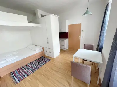 Ein Bett oder Betten in einem Zimmer der Unterkunft Metro Apartments Vienna